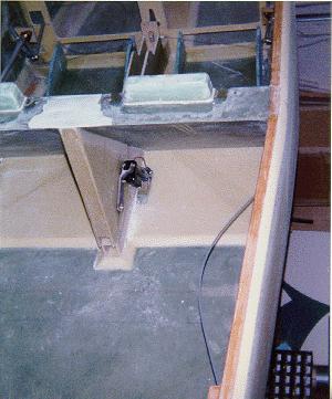 Speed brake actuator attached